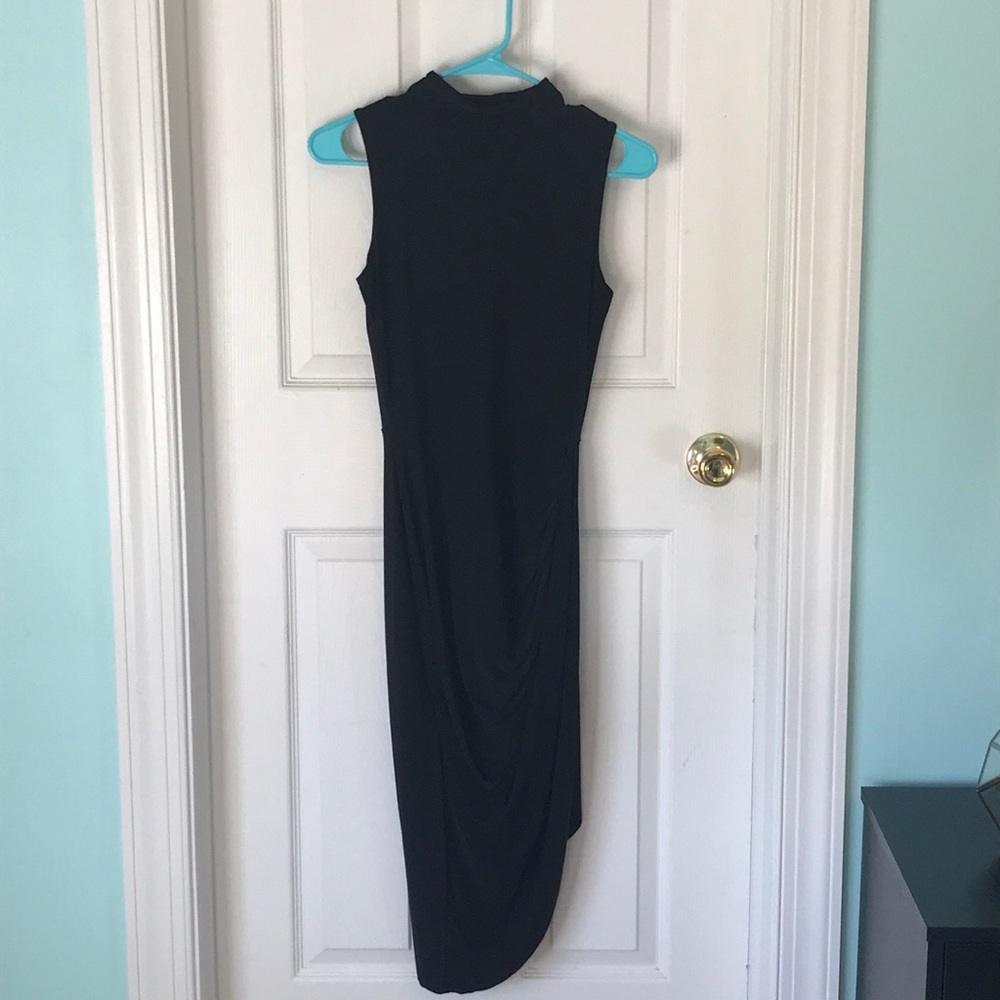 Black formal, fitted ruched dress.